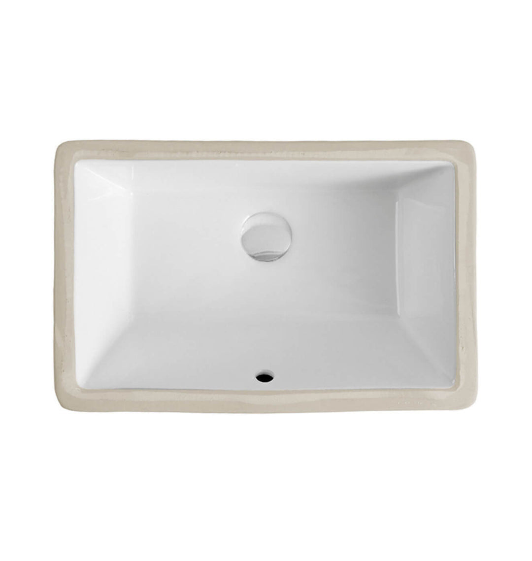 Lavabo sous plan profond avec trop-plein intégré, idéal pour une salle de bain moderne.
